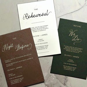 May include: Three wedding invitation cards. One is white with the words "The Rehearsal" in cursive. Another is brown with "The Night Before" in cursive. The third is dark green with "Before We Do" in cursive.