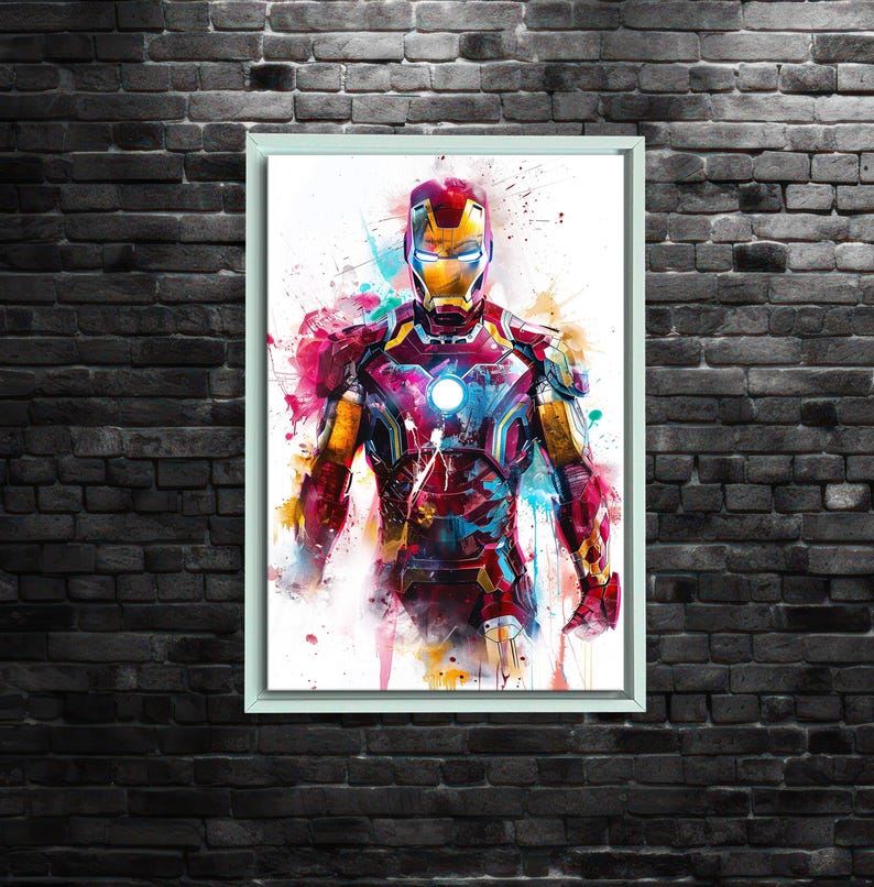 K&ouml;nnte beinhalten: Ein gerahmtes Aquarellgem&auml;lde von Iron Man. Das Kunstwerk zeigt den Superhelden in seiner ikonischen rot-goldenen R&uuml;stung mit Farbspritzern in Blau, Rosa und Gelb. Das Bild ist vor einem wei&szlig;en Hintergrund.