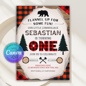 May include: A birthday invitation with a lumberjack theme. The design features a black bear silhouette, pine trees, and the text "Flannel Up For Some Fun!" The invitation includes the name "Sebastian" and the number "One" in a red and black plaid pattern.