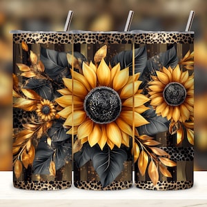 May include: Three stainless steel tumblers with a gold and black sunflower design. The tumblers have a black and gold striped background with a leopard print accent.
