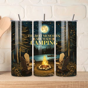 May include: Three stainless steel tumblers with lids and straws. The tumblers feature a forest scene with a campfire, a full moon, and the text "The Best Memories Are Made Camping".