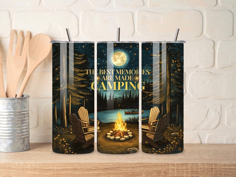 May include: Three stainless steel tumblers with lids and straws. The tumblers feature a forest scene with a campfire, a full moon, and the text "The Best Memories Are Made Camping".