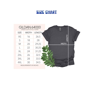 May include: A size chart for a Gildan 64000 unisex softstyle t-shirt. The chart shows measurements in inches for sizes XS to 4XL, including width and length. A dark gray t-shirt is shown with length and width indicators.