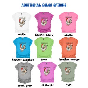 May include: A collection of t-shirts in various colors, each featuring a rooster graphic and the text "CHICKEN LADY". Colors include white, pink, blue, green, orange, grey, and purple. The phrase "ADDITIONAL COLOR OPTIONS" is at the top.