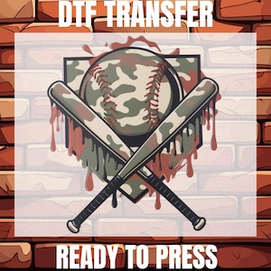 May include: DTF TRANSFER graphic featuring a baseball with camouflage pattern and crossed baseball bats. The design includes dripping paint effects and the text "READY TO PRESS" on a brick wall background.