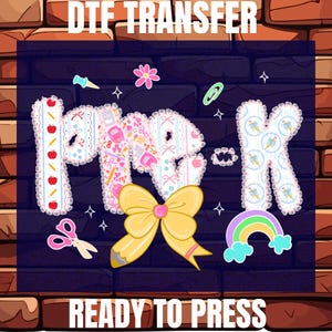 May include: A DTF transfer sheet featuring the text PRE-K in a playful font with various patterns including apples, pencils, and bows. The design includes a large yellow bow, a pink pair of scissors, a rainbow, and small icons like a paperclip.