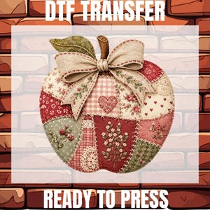 May include: A DTF TRANSFER READY TO PRESS graphic featuring a patchwork apple design. The apple is composed of various fabric patterns in red, pink, green, and cream, including floral prints, gingham, and lace, topped with a beige fabric bow.