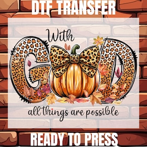 May include: DTF transfer design featuring the word "GOD" with leopard print accents, a pumpkin with a leopard print bow, and fall leaves. The phrase "all things are possible" is written below the pumpkin, with "READY TO PRESS" at the bottom.