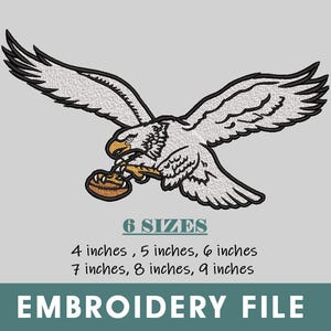 May include: An embroidered design of an eagle in flight, clutching a football in its talons. The eagle is rendered in white and black thread, with a yellow beak and a brown football. The text "6 SIZES" and size options are below the image. The words "EMBROIDERY FILE" are at the bottom.