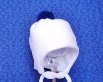 Winter Baby Fleece Hat White with Royal Blue Pom Pom and Chin Ties