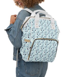 Mochila elegante con diseño floral para pañales: elegante bolso para mamás, regalo único para nuevos padres, portabebés versátil, esencial para baby shower.