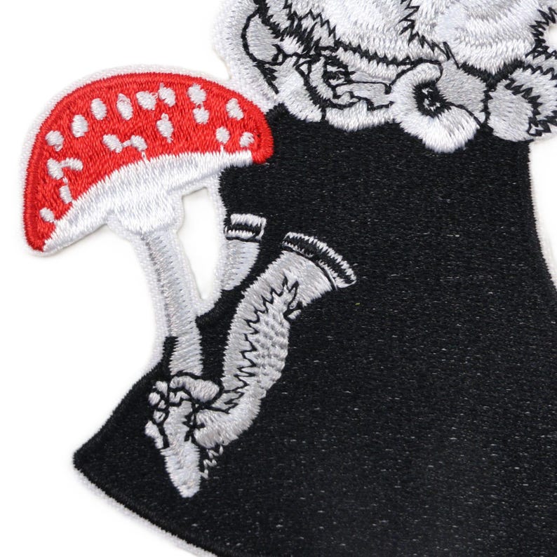 Embroidered rabbit with red toadstool patch in rockabilly and folklore style, iron-on applique for jackets, bags, or clothing.jpg