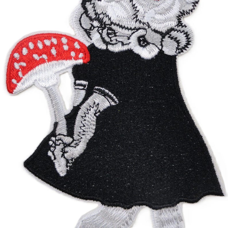 Embroidered rabbit with red toadstool patch in rockabilly and folklore style, iron-on applique for jackets, bags, or clothing.jpg
