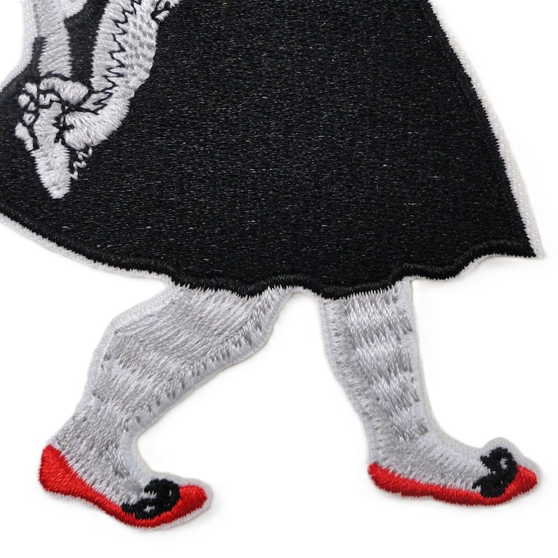 Embroidered rabbit with red toadstool patch in rockabilly and folklore style, iron-on applique for jackets, bags, or clothing.jpg