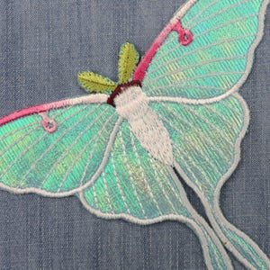 Iridescent turquoise iron-on embroidered Luna moths patch, suitable for decorating clothes, jackets, and bags, ideal for DIY projects.jpg