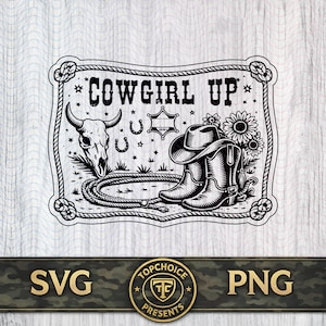 May include: Black and white graphic with the text "COWGIRL UP" inside a decorative frame. The image features a bull skull, cowboy boots, a hat, a lasso, horseshoes, and flowers, evoking a Western theme.