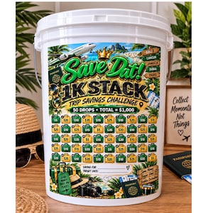 May include: A white plastic bucket featuring a travel-themed savings challenge label. The graphic includes an airplane, a gold crown, and text reading Save Dat! 1K STACK TRIP SAVINGS CHALLENGE. It displays 50 numbered suitcase icons with dollar amounts.