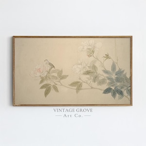 May include: A framed vintage print featuring a bird perched on a flowering branch. The artwork showcases a soft color palette with a beige background, delicate pink and white flowers, and muted green and blue foliage. The text "VINTAGE GROVE - Art Co." is at the bottom.