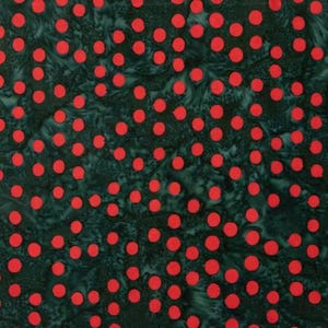 May include: A dark green fabric with a repeating pattern of red polka dots.