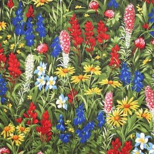 May include: A colourful floral pattern featuring blue, red and yellow wildflowers on a green background. The pattern is reminiscent of a wildflower meadow.