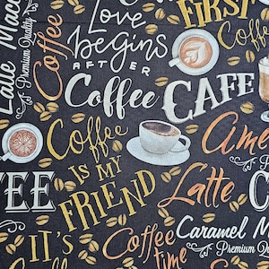 May include: Black fabric featuring coffee-related text and imagery. The design incorporates coffee cups, coffee beans, and phrases such as "Coffee Time," "Good Vibes," and "Coffee Cafe." The text is in white and gold.