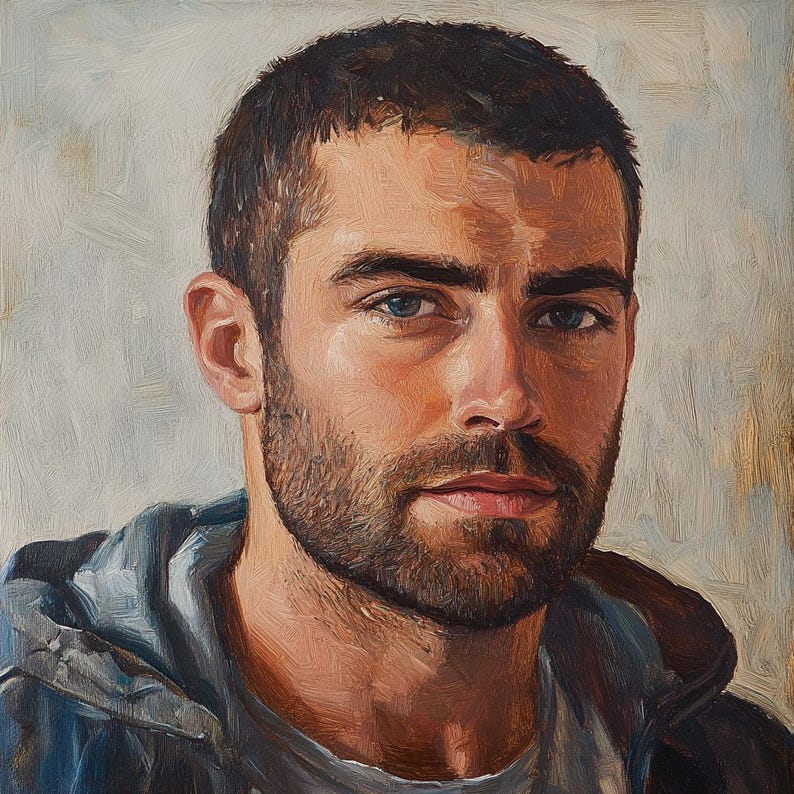 May include: Oil painting portrait of a man with short brown hair, a beard, and blue eyes. He wears a gray t-shirt and a blue hooded jacket. The artwork has visible brushstrokes and a soft, warm color palette.