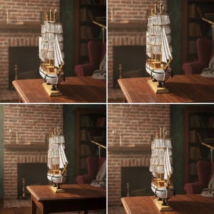 May include: A detailed model ship with white sails and gold accents. The ship is displayed on a wooden stand and table, set against a backdrop of a brick fireplace and bookshelves. The model is approximately 12 inches in height.