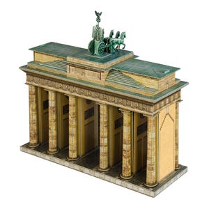 May include: A detailed model of the Brandenburg Gate, featuring a green Quadriga statue atop a tan and green structure. The model has multiple columns and a detailed facade, showcasing architectural elements.
