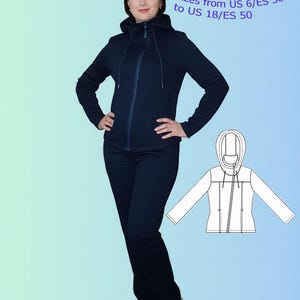 May include: A navy blue sports jacket and trousers are modelled by a woman. The jacket features a hood and a zip. A diagram of the jacket is included, along with the text: "Pattern of sports jacket sizes from US 6/ES 36 to US 18/ES 50."