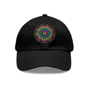 May include: A black baseball cap with a colorful mandala design embroidered on the front.