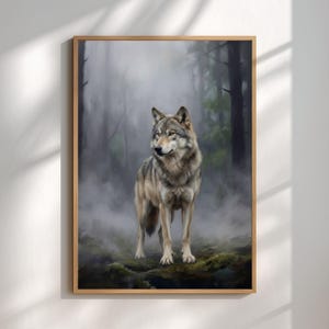 May include: A framed art print featuring a realistic painting of a gray wolf standing in a misty forest. The wolf is depicted with detailed fur and attentive eyes, set against a backdrop of trees and fog. The artwork is encased in a natural wood frame.