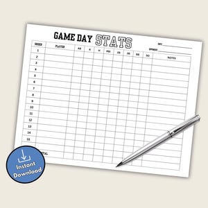 May include: A white baseball game day stats sheet with the title "GAME DAY STATS" at the top. The sheet has columns for player stats and a space for notes. A silver pen rests on the sheet. A blue circle with "Instant Download" text is in the corner.