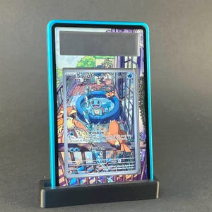 Squirtle 148/142 / Stellar Crown Auraslab (classificato)