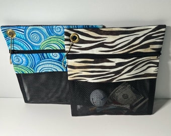 Zippered Bag the perfect golfing accessory. Visible at a glance your golf tees, golf balls, money and/or cell phone.