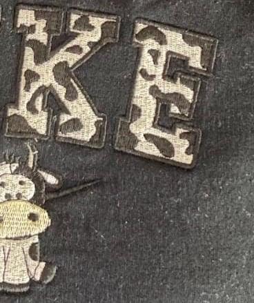 nike cow print embroidered sweatshirt