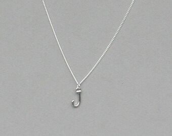 j initial charm