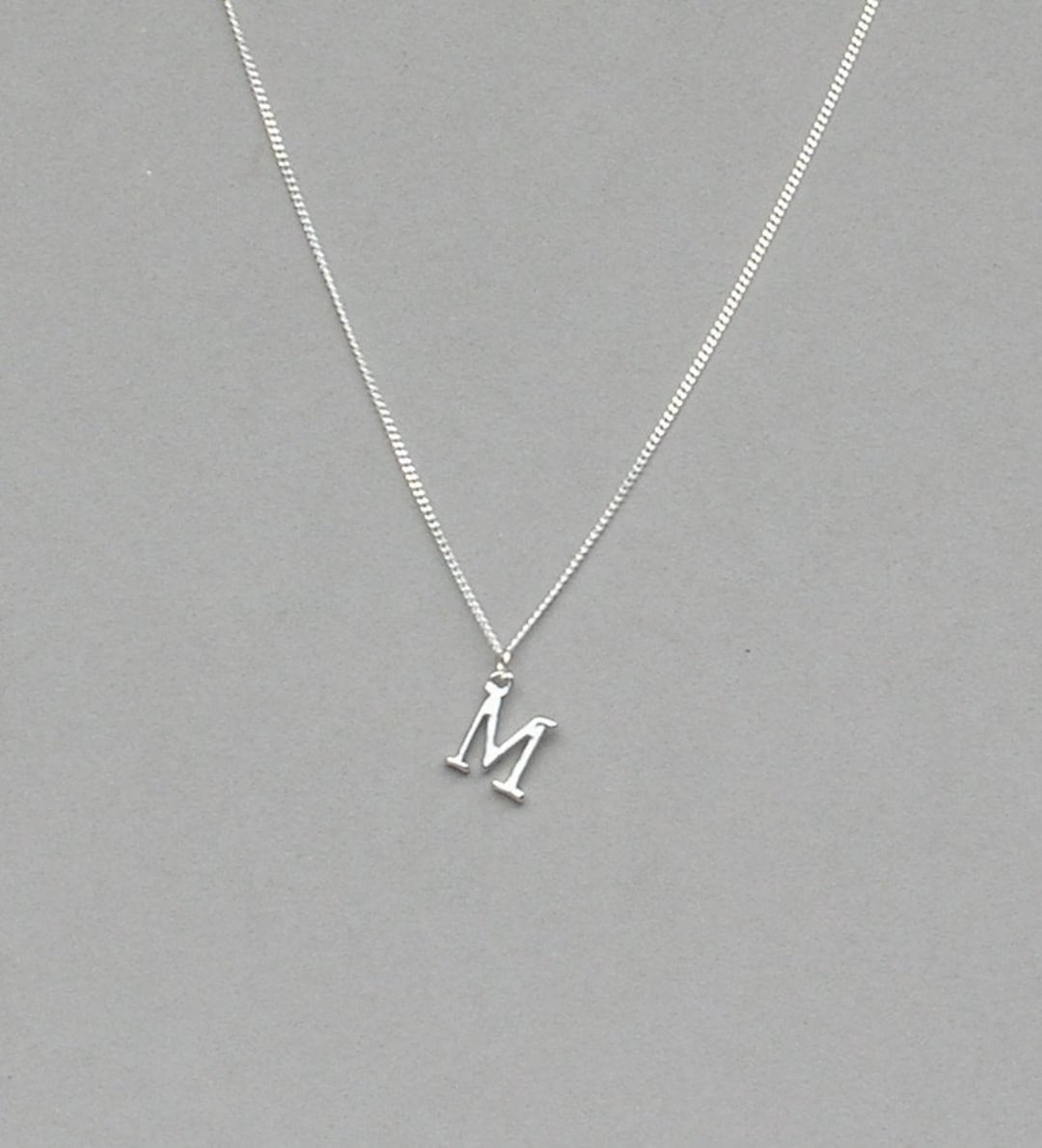 新品！MUZE - M LOGO NECKLACE (MATTE BLACK) Silver Plated Initial M