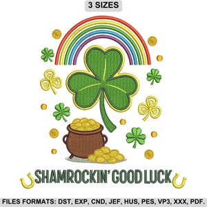 May include: Embroidered design featuring a large green shamrock, a rainbow, and a pot of gold. Gold coins and smaller shamrocks are scattered around the design. Text reads "SHAMROCKIN' GOOD LUCK". The words "3 SIZES" are at the top.