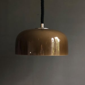 May include: A brown, dome-shaped pendant light with a black cord.