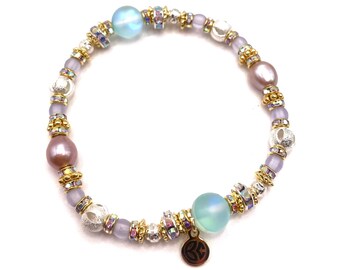 Pulsera apilable de cuentas: cuentas vintage, cristal y detalles en oro de 18 quilates