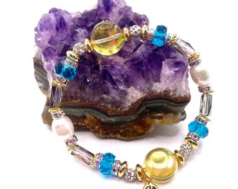 Pulsera vintage de cuentas apilables, cristal Swarovski y oro de 18 quilates