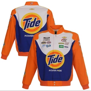 May include: A racing jacket in orange, white, and blue featuring the Tide logo on the chest and back. The front displays multiple sponsor logos including NASCAR, Goodyear, Bush's, and Gillette. The number 37 is printed on the collar and sleeves.