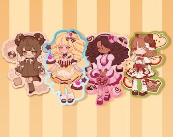 May include: Four chibi-style character stickers featuring distinct themes. One wears a brown dress with cookies, another a yellow outfit with cupcakes, a third a pink dress with chocolates, and the fourth a red and white outfit with apple slices.