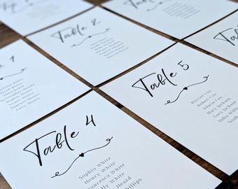 Black and White Calligraphy Wedding Seating Plan Cards - Find your seat