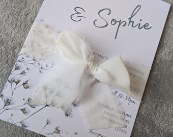 White dainty gypsophila wedding invitation set.