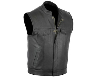 May include: Black leather vest with a stand-up collar, two chest pockets, and two hand pockets. The vest has a zip-up front and a rounded bottom hem. The vest is sleeveless and appears to be made of a durable material.
