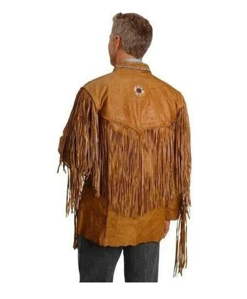 May include: A brown leather jacket with fringe detailing. The jacket has a beaded design on the back.