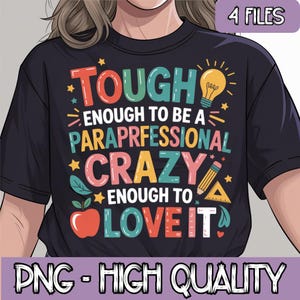 May include: A black t-shirt with a colorful graphic design that says "Tough Enough To Be A Paraprofessional Crazy Enough To Love It".