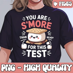May include: Dark navy blue t-shirt with a graphic featuring a smiling s'more between two graham crackers. The text reads "You are S'more than ready for this test." The words "PNG - HIGH QUALITY" are at the bottom.