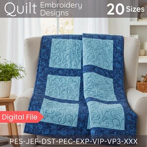 Puede incluir: Un edredón azul con un diseño de delfines sobre una silla. El edredón presenta cuadrados azul claro con bordados de delfines, sobre un fondo con estampado floral azul oscuro. El texto "Quilt Embroidery Designs" y "20 Sizes" son visibles.
